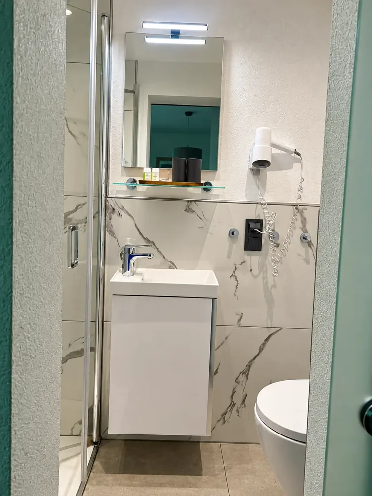 Clean private bathroom with modern fittings