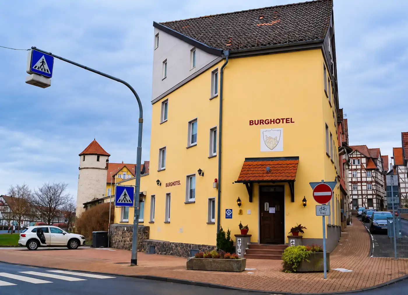 Street-level view of Burghotel Homberg near the historic old town