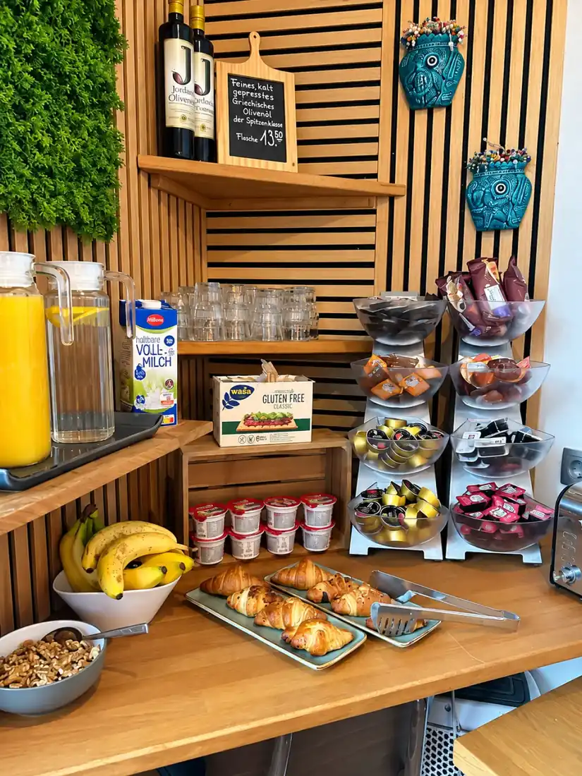 Burghotel Homberg breakfast buffet with pastries, fruit and drinks